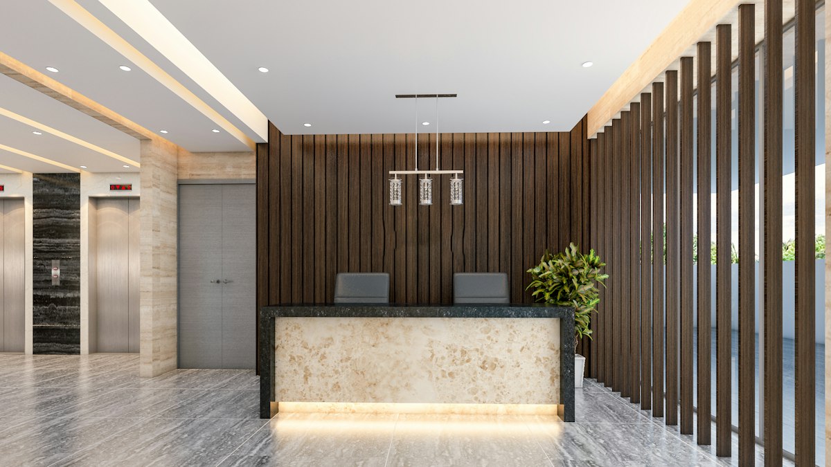 Building entrance lobby with reception and lifts